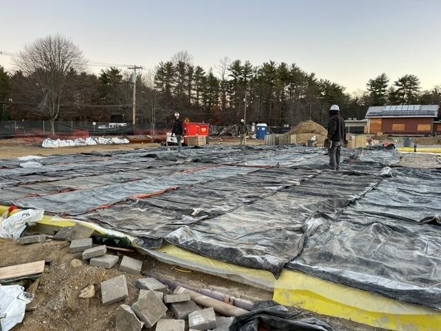 Insulated blankets for concrete curing, with heated hoses running beneath