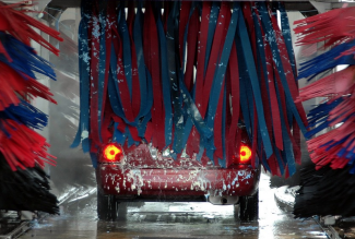 Vehicle going through a car wash